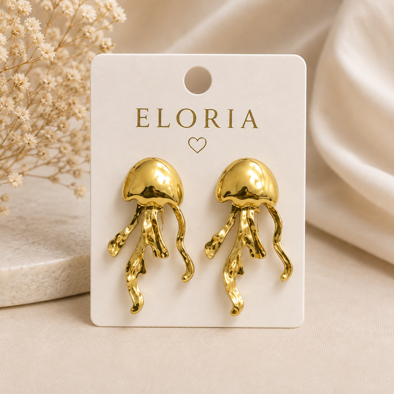 ELORIA Aurelia Jellyfish Earrings displayed on a jewelry card