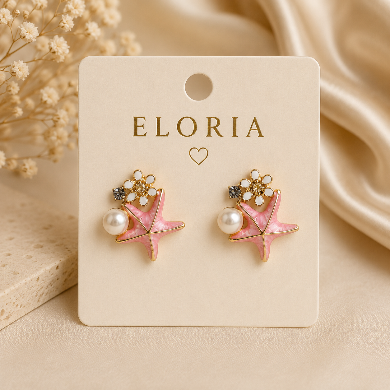 ELORIA pink starfish earrings with pearl and floral crystal detailing